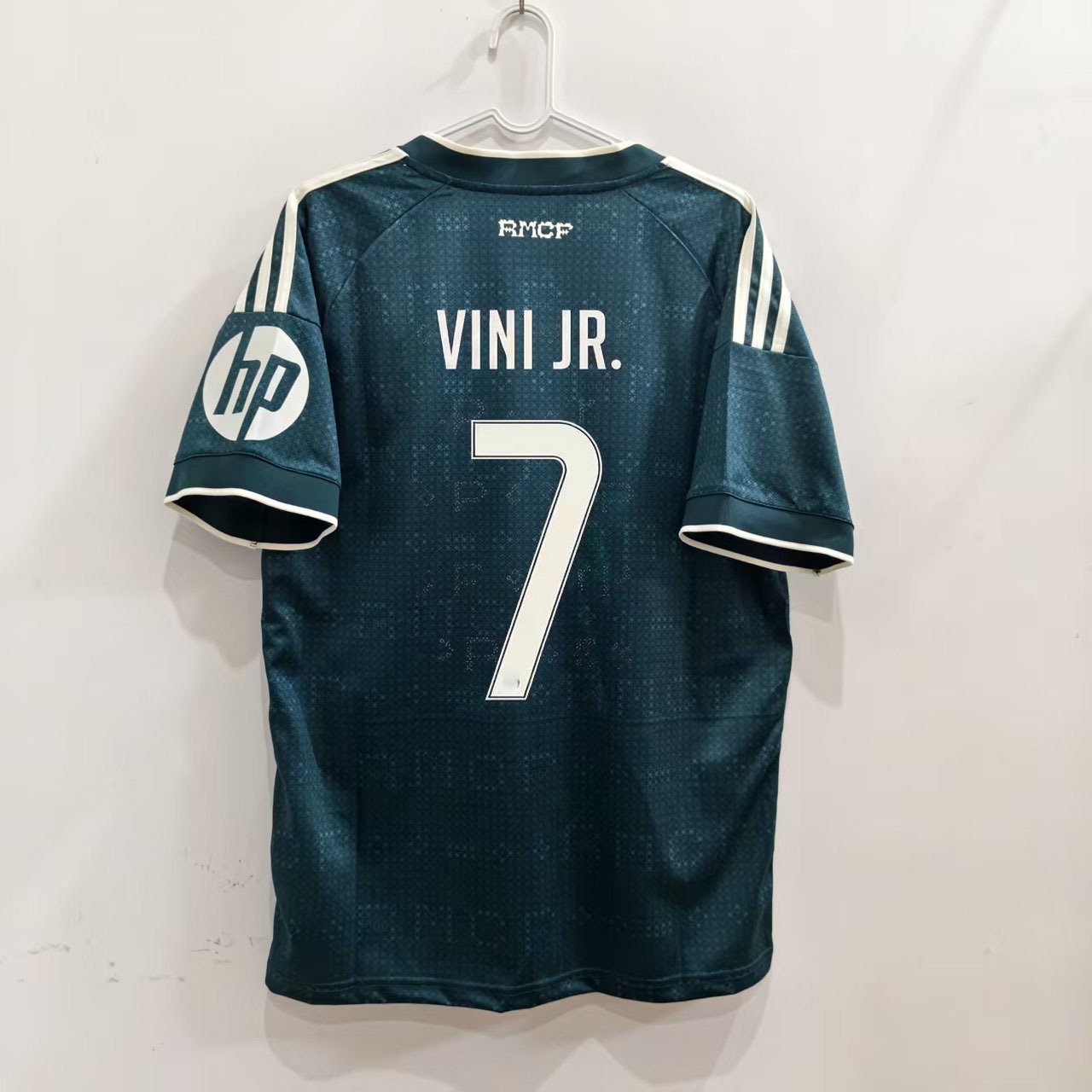 Real Madrid VINI JR. 7 zelený hosťovský dres 2026/27 – zadná strana
